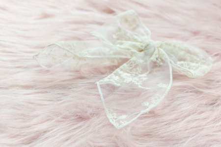 Luxury hair clip on pink fabric with copyspace.の写真素材
