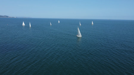 Sailing boats in the Irish Sea off the coast of Dun Laoghaire, Dublin, Ireland