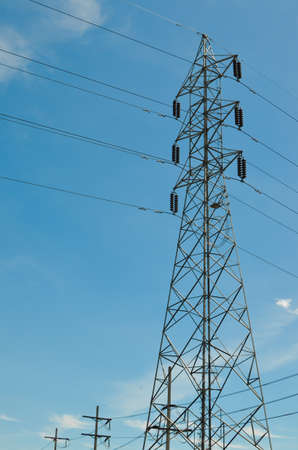 power pole silhouette against blue skyの写真素材