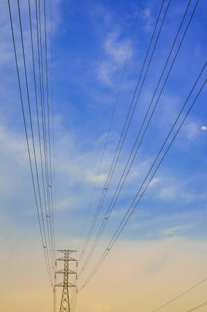 High voltage power pylons at sunset, Thailandの写真素材