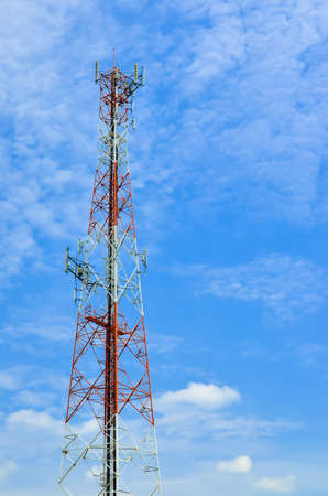 Telecommunications tower on blue sky background の写真素材