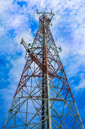 Telecommunications tower on blue sky background の写真素材