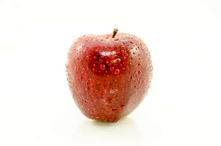 Fresh red apple with water droplets and leaf, isolated on white background の写真素材