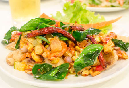 Fried fish with herbs, health food, nutritional Thailand.の写真素材