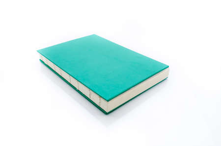 Green spiral notebook isolated on white background with clipping path.の写真素材