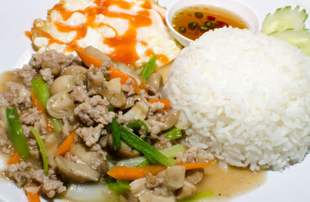 stir-fried mixed vegetables with pork and rice.の写真素材