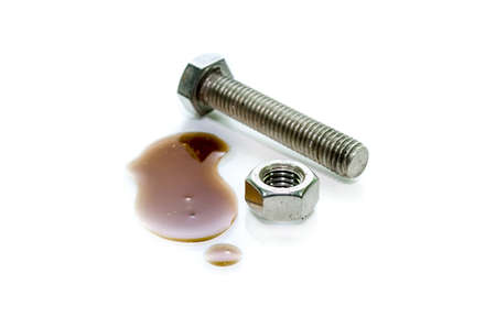 Wrong wrench for hex nut on white backgroundの写真素材