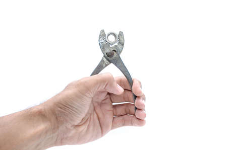 hand with pilers isolated on white backroundの写真素材