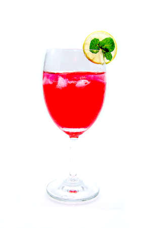 Red cocktail with splash and lime slice isolated on white backgroundの写真素材