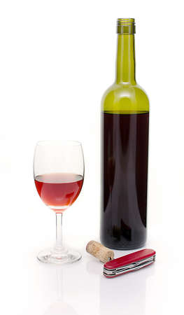 Red wine, corks and corkscrew  Isolated on white backgroundの写真素材