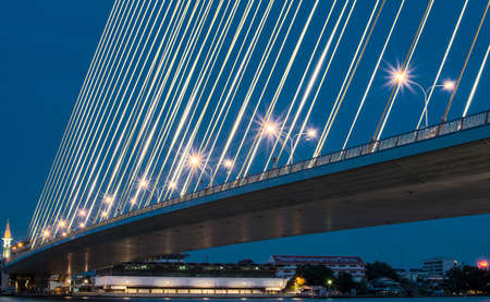 Rama 8 Bridge At Night, in Bangkok Thailand.の写真素材