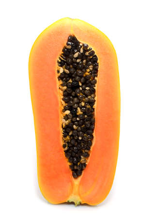 Half cut and whole papaya fruits on white backgroundの写真素材