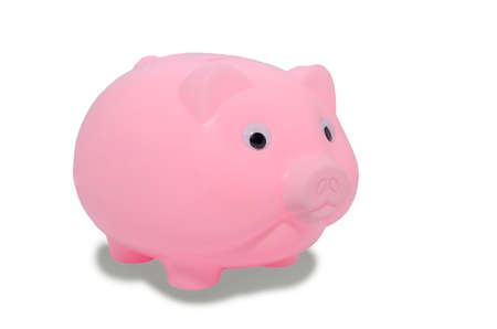 pink piggy bank isolated on white backgroundの写真素材