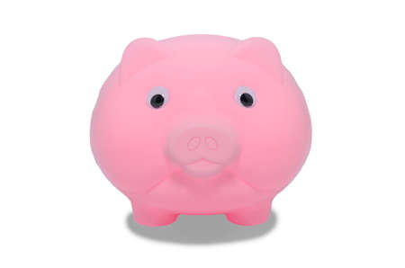 pink piggy bank isolated on white backgroundの写真素材