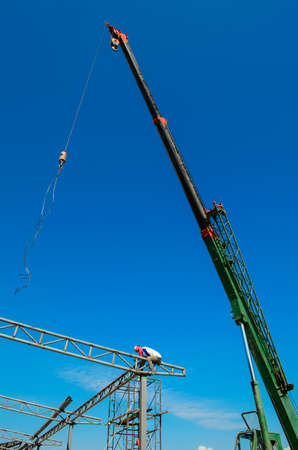 auto crane on construction siteの写真素材