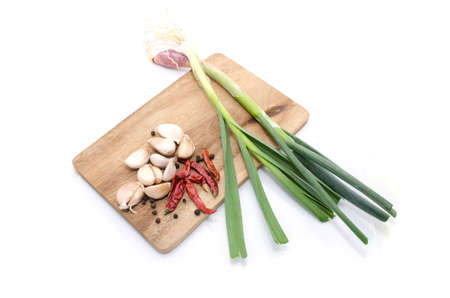 Fresh vegetables on the board isolate on white backgroundの写真素材