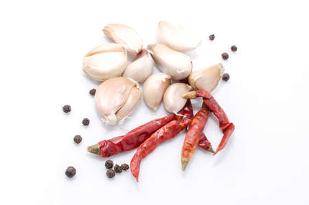 Chili pepper and spice isolated on white backgroundの写真素材
