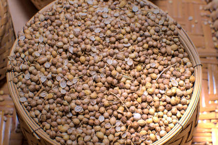 close up of a bowl of coriander seedsの写真素材