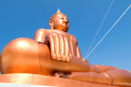 Buddha Statue on blue sky backgroundの写真素材