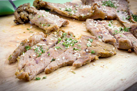 Delicious beef steaks on wood, Cut into piecesの写真素材