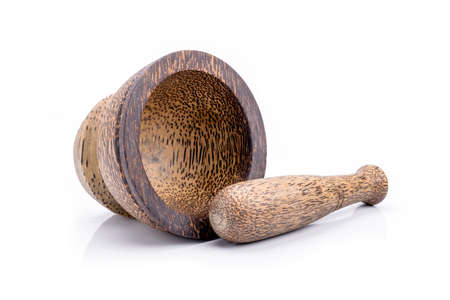 Wooden mortar and pestle on white backgroundの写真素材