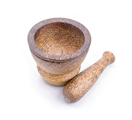 Wooden mortar and pestle on white backgroundの写真素材