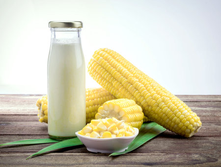 Corn on a wooden table.