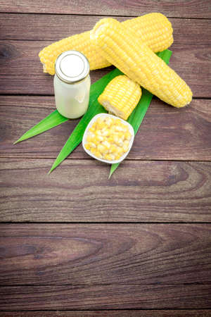 Corn on a wooden table.の写真素材