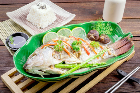 tilapia fish steamed with soy sauce, Thai food.の写真素材