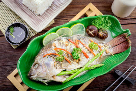 tilapia fish steamed with soy sauce, Thai food.の写真素材