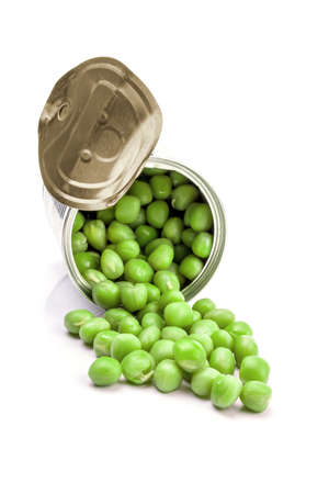 Opened tin with green peas. Isolated on white.の写真素材