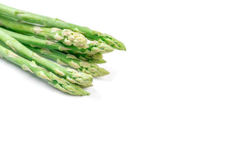 Fresh green asparagus on white backgroundの写真素材