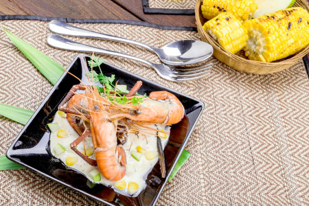 Fried shrimps Apple Sauce with glass of beerの写真素材