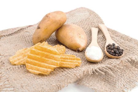 Heap of Pepper Potato Chips on rustic backgroundの写真素材