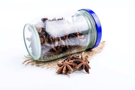 Star anise spice fruits and seeds isolated on white background closeupの写真素材