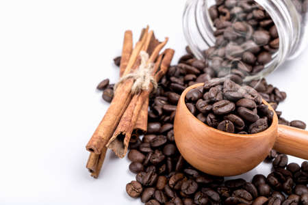 Close up coffee beans on wooden spoonの写真素材