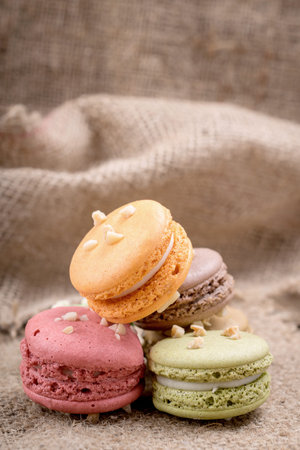 French macaroons on sack backgroundの写真素材