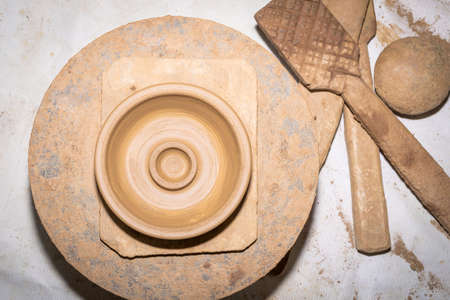 manufacture of ceramic vessel hands of the child and adult, Household pottery rural north of Thailand.の写真素材