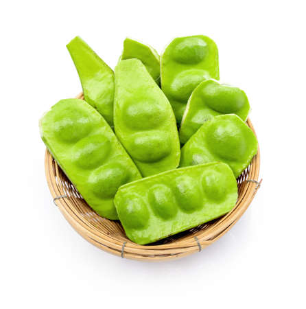 Tropical stinking edible beans in basket on white background. (Parkia Speciosa)の写真素材