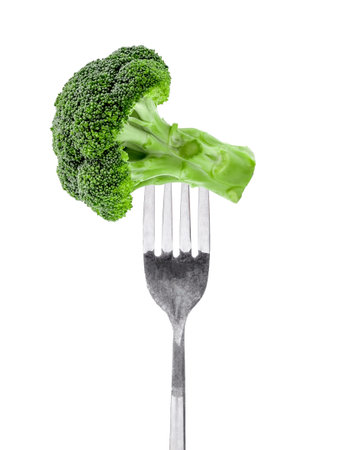 Fresh Broccoli on fork isolated on white background