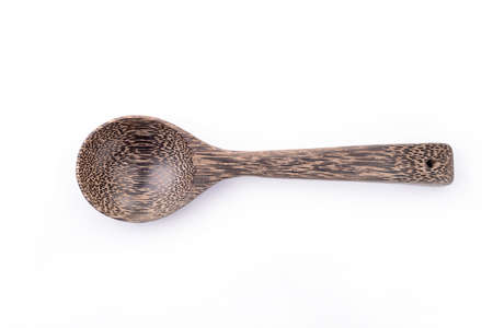 Wooden spoon on White backgroundの写真素材