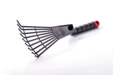 rake isolated on white backgroundの写真素材