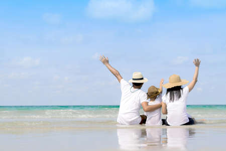 Blur happy beautiful family Having Fun on Beautiful Sunny Beachの写真素材