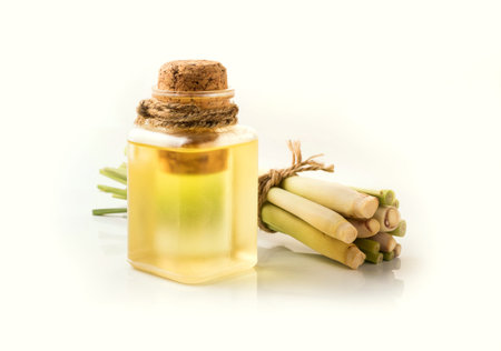 Lemongrass Essential Oil on white background.の写真素材