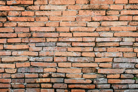 Through an ancient brick background. Surface textures.の写真素材