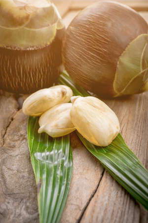 Asian Palmyra palm, fruit on wooden background.の写真素材