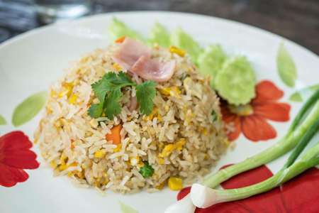 Fried Rice Thailand style and Vegetables on wood tableの写真素材