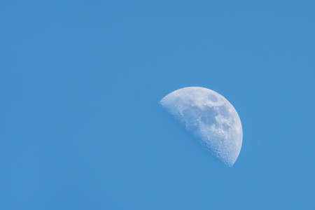 moon in blue sky during the dayの写真素材