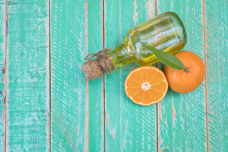 orange fresh berries on the wooden floor with space for adding text.の写真素材