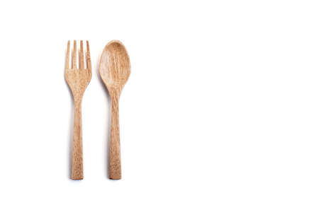 Wooden spoon and fork on white background.の写真素材